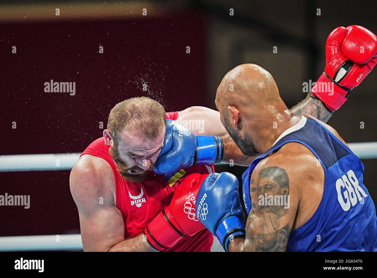 July 29, 2021: Frazer Clarke from Great Britain and Tsotne Rogava from Ukraine during pre final boxing knock out rounds at Kokugikan arena at the Tokyo Olympics, Tokyo, Japan. Kim Price/CSM Credit: Cal Sport Media/Alamy Live News Stock Photo