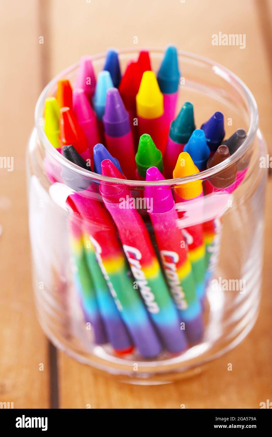 Colorful pastel crayons in glass holder, closeup Stock Photo Alamy