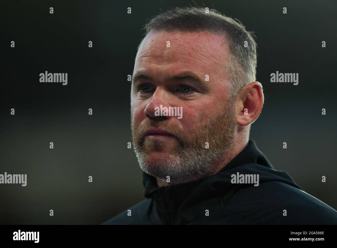 DERBY, UK. JULY 28TH Wayne Rooney, manager of Derby County gets interviewed by the waiting media during the Pre-season Friendly match between Derby County and Real Betis Balompi at the Pride Park, Derby on Wednesday 28th July 2021. (Credit: Jon Hobley | MI News) Credit: MI News & Sport /Alamy Live News Stock Photo