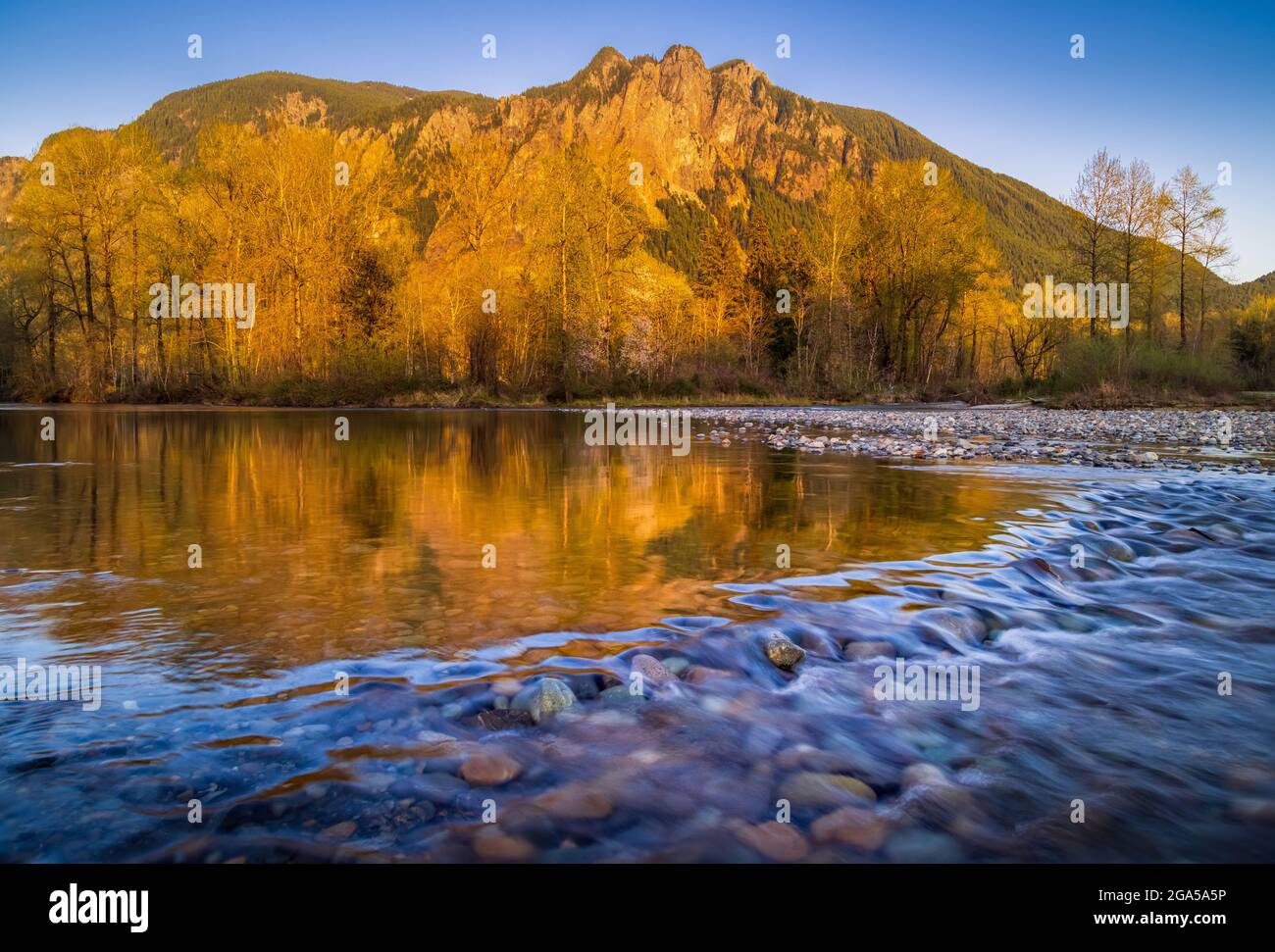 Mount Si reflected in the Snoqualmie River in North Bend, Washington Stock Photo