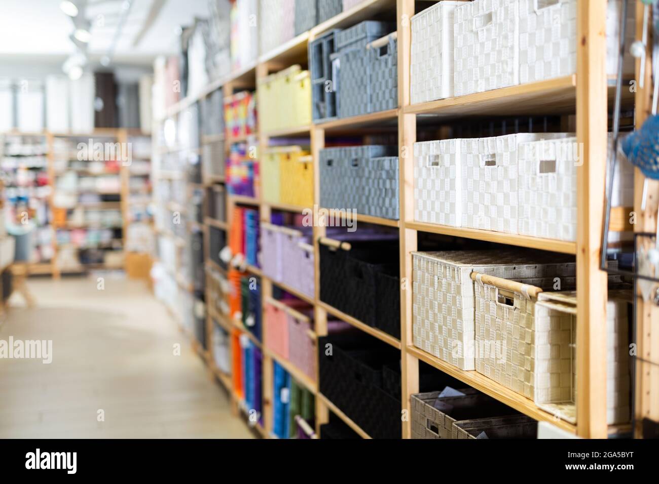Decorative storage boxes on shelving in household goods store Stock Photo Alamy