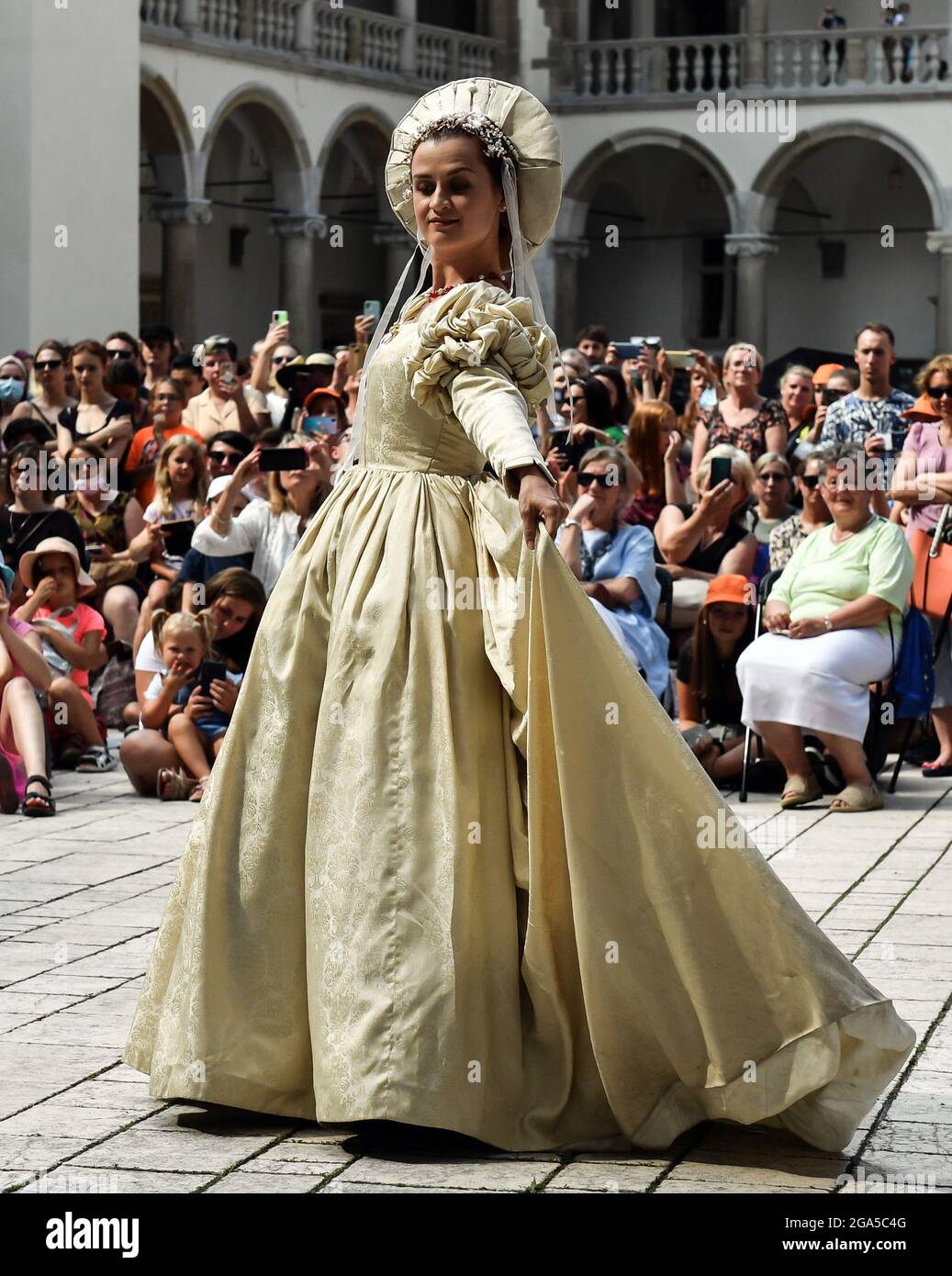 Krakow, Poland. 24th July, 2021. A performer dancing on stage during the fashion show.Dancers from the Terpsichore Dance Theatre and actors from Nomina Rosae Teatr presented a reconstruction of Renaissance fashion in the courtyard of the Wawel Royal Castle in Krakow. (Credit Image: © Alex Bona/SOPA Images via ZUMA Press Wire) Stock Photo