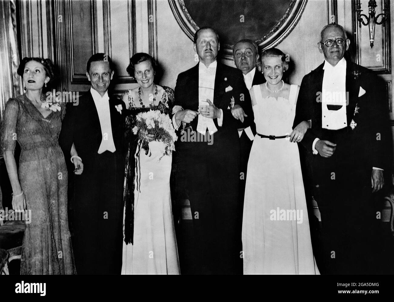 LENI RIEFENSTAHL in June 1936 at the Italian Embassy in Berlin accompanied by Nazi Propaganda Minister JOSEPH GOEBBELS and his Wife receives Italian Award for Best Film for TRIUMPH OF THE WILL / TRIUMPH DES WILLES (released in 1935) from Countess CIANO daughter of Benito Mussolini Stock Photo