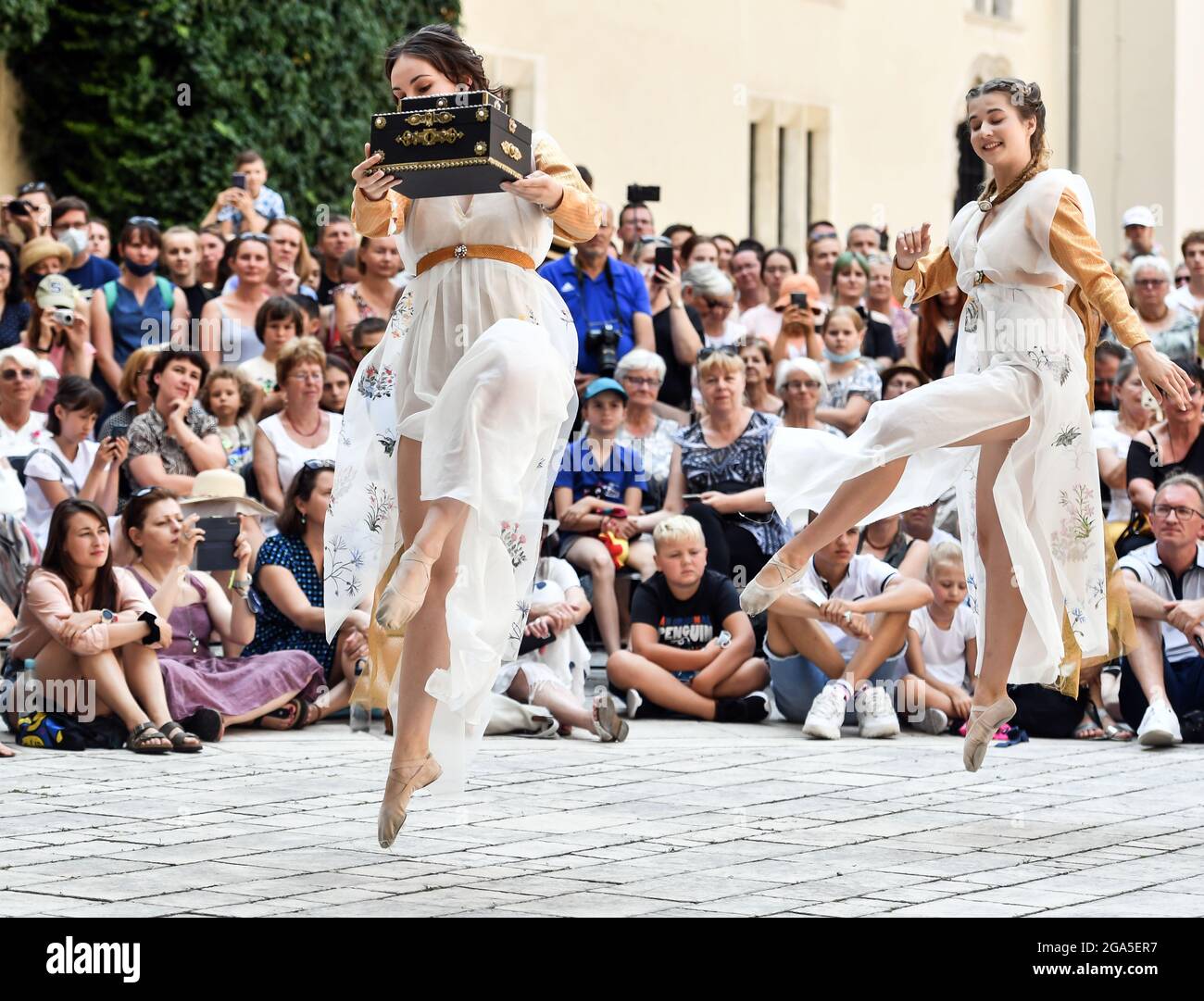 Krakow, Poland. 24th July, 2021. Performers dancing on stage during the fashion show.Dancers from the Terpsichore Dance Theatre and actors from Nomina Rosae Teatr presented a reconstruction of Renaissance fashion in the courtyard of the Wawel Royal Castle in Krakow. (Photo by Alex Bona/SOPA Images/Sipa USA) Credit: Sipa USA/Alamy Live News Stock Photo