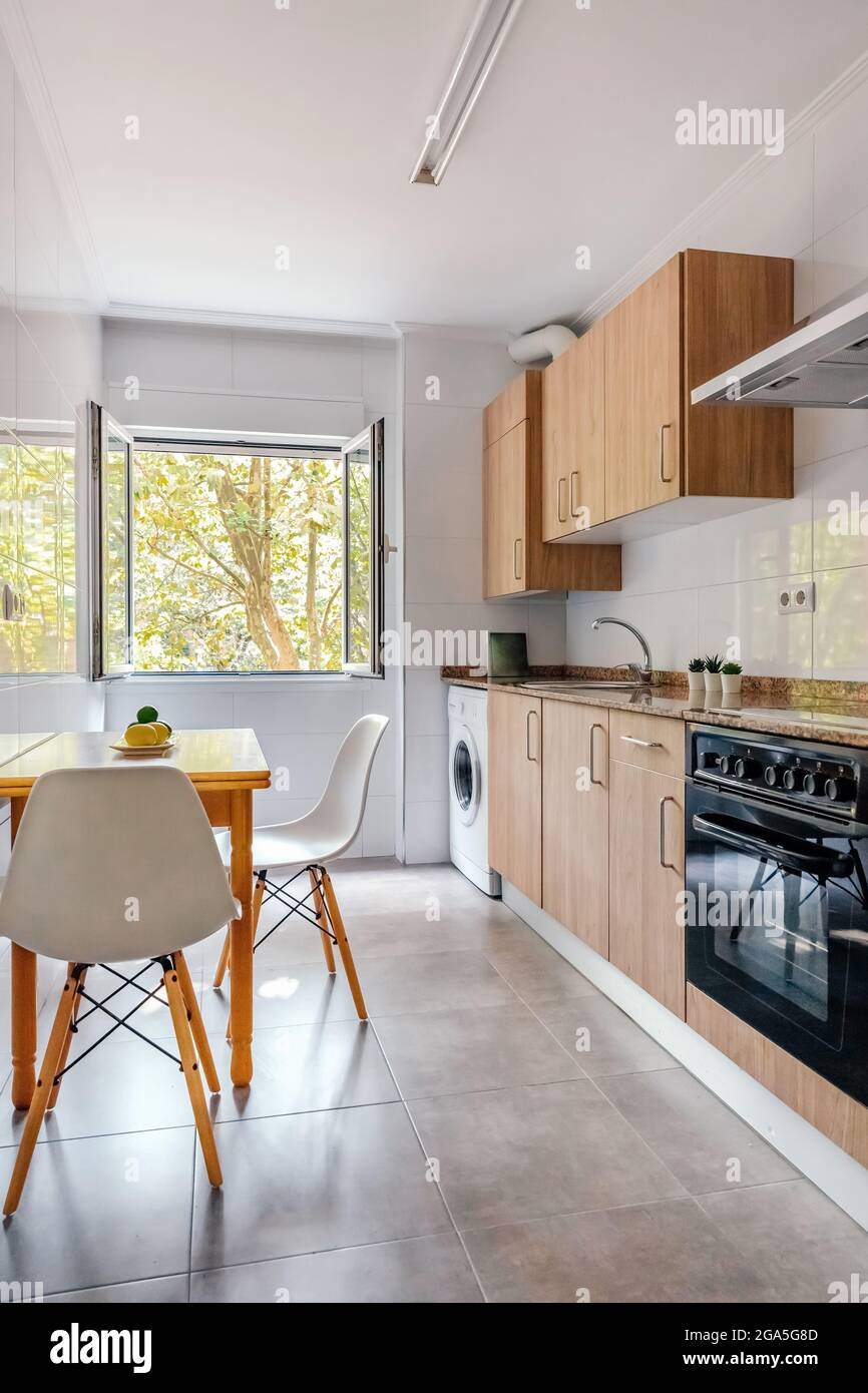 Kitchen interior with furniture and appliances Stock Photo - Alamy