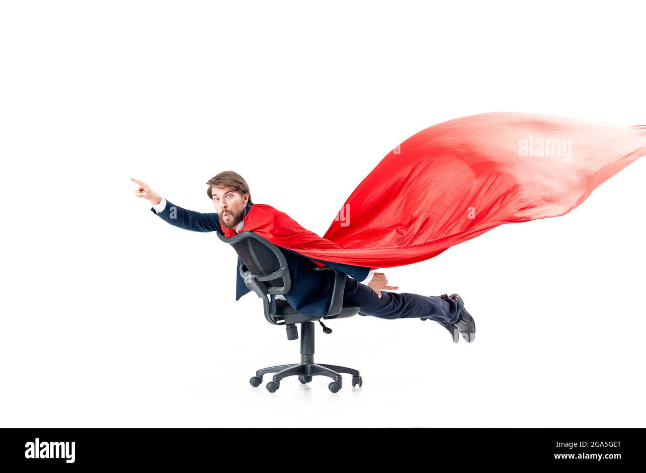 business man with red cloak trying in superman office chair Stock Photo -  Alamy