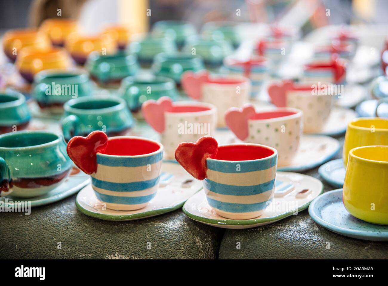 handmade ceramic coffee cups with love Stock Photo