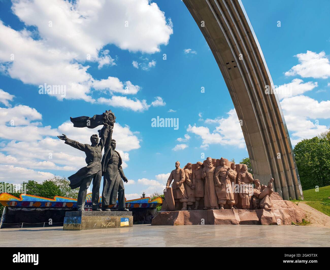 Kiev, Ukraine-April 28, 2018: Sculptures under the Arch of Friendship ...
