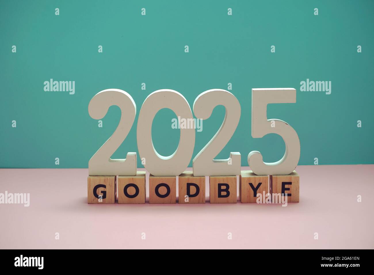 Goodbye 2025 alphabet letter on blue and pink background Stock Photo