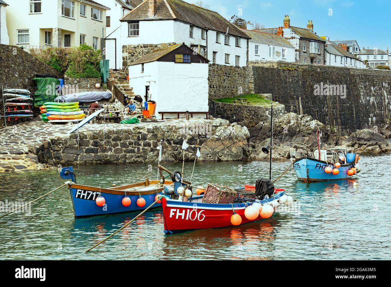 The harbour in the traditional fishing village of coverack in cornwall england Stock Photo