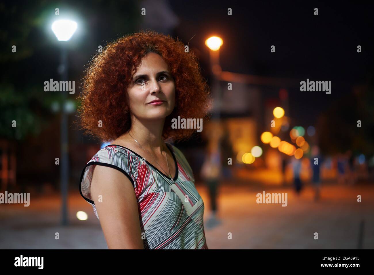 Candid portrait curly redhead woman hi-res stock photography and images ...