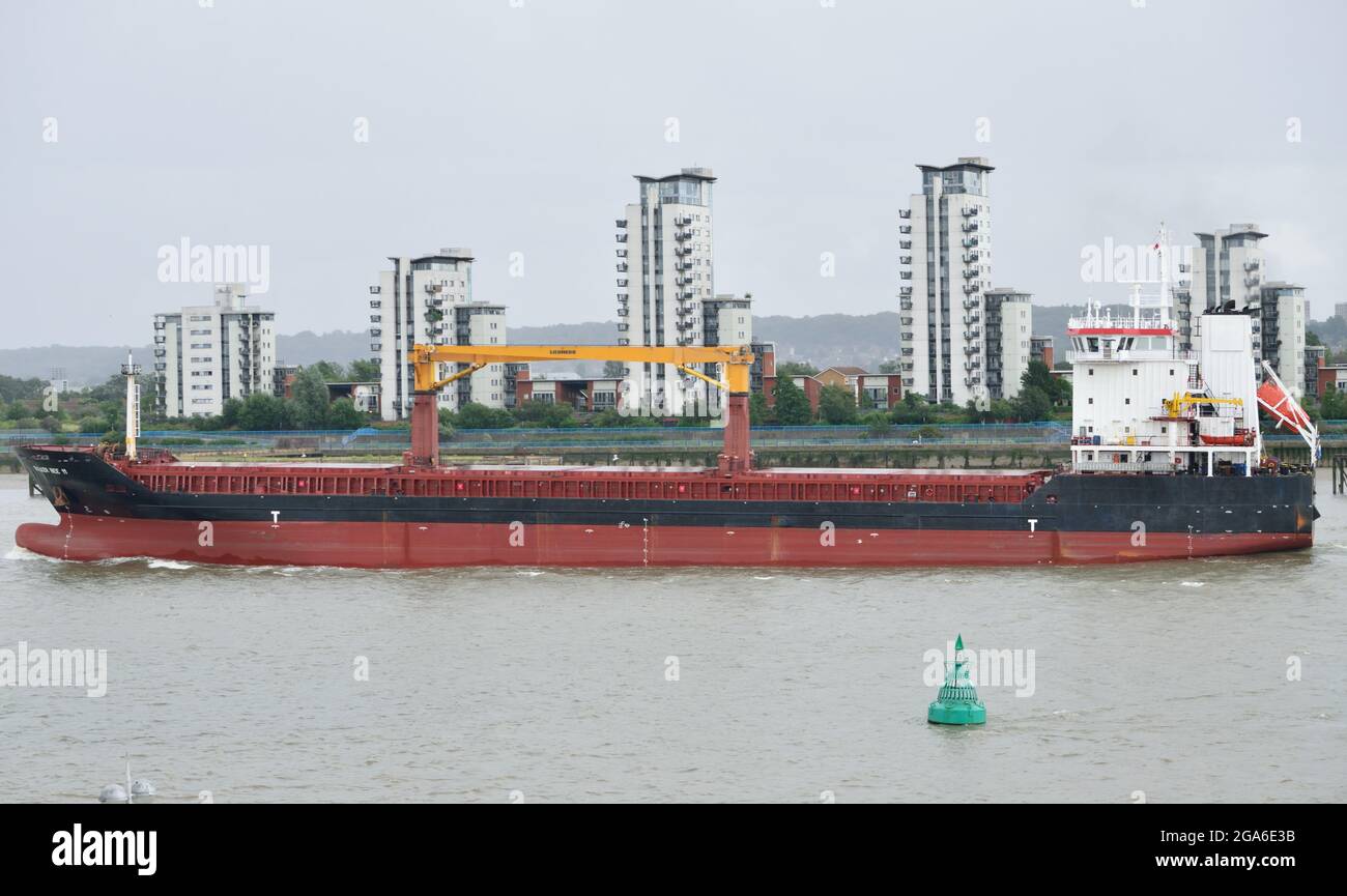 Cargo ship BULKER BEE 11 departing London after unloading a cargo of cane sugar at Tate & Lyle Sugar's Thames Refinery at Silvertown Stock Photo