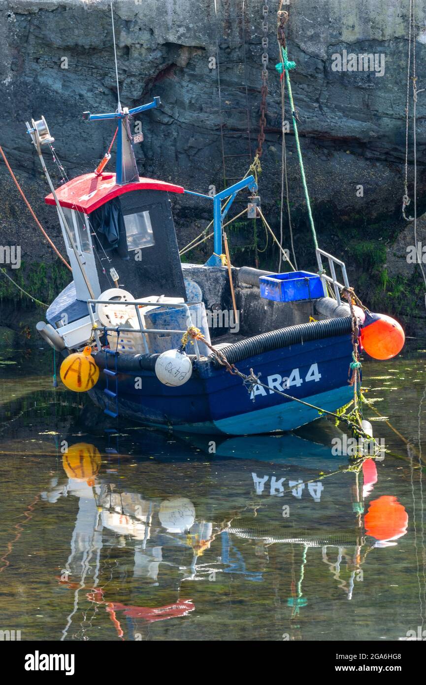 small inshore fishing boat, scottish fishing trawler, fishing boat at dunure harbour in ayrshire
