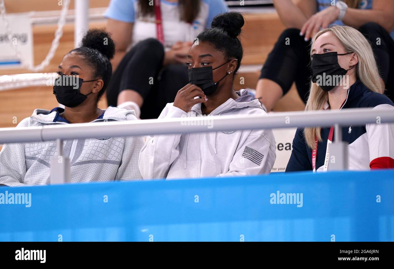 USA's Jordan Chiles (left), Simone Biles (centre), and Mykayla Skinner in the stands during the Women's All-Around final at the Ariake Gymnastic Centre on the sixth day of the Tokyo 2020 Olympic Games in Japan. Picture date: Thursday July 29, 2021. Stock Photo