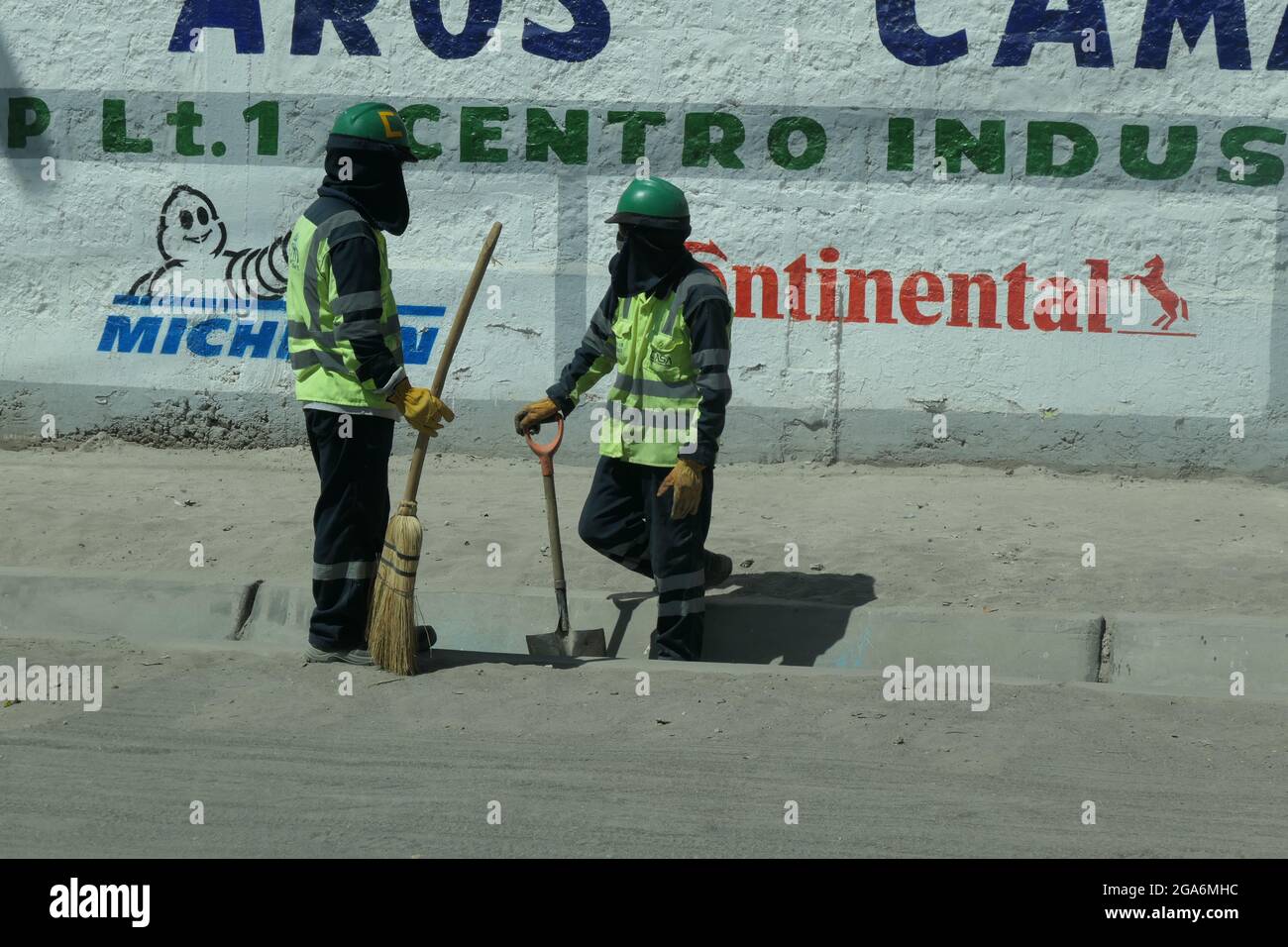 Sign Sweeper road cleaners or sweepers in Peru workmen workwoman workers working ...