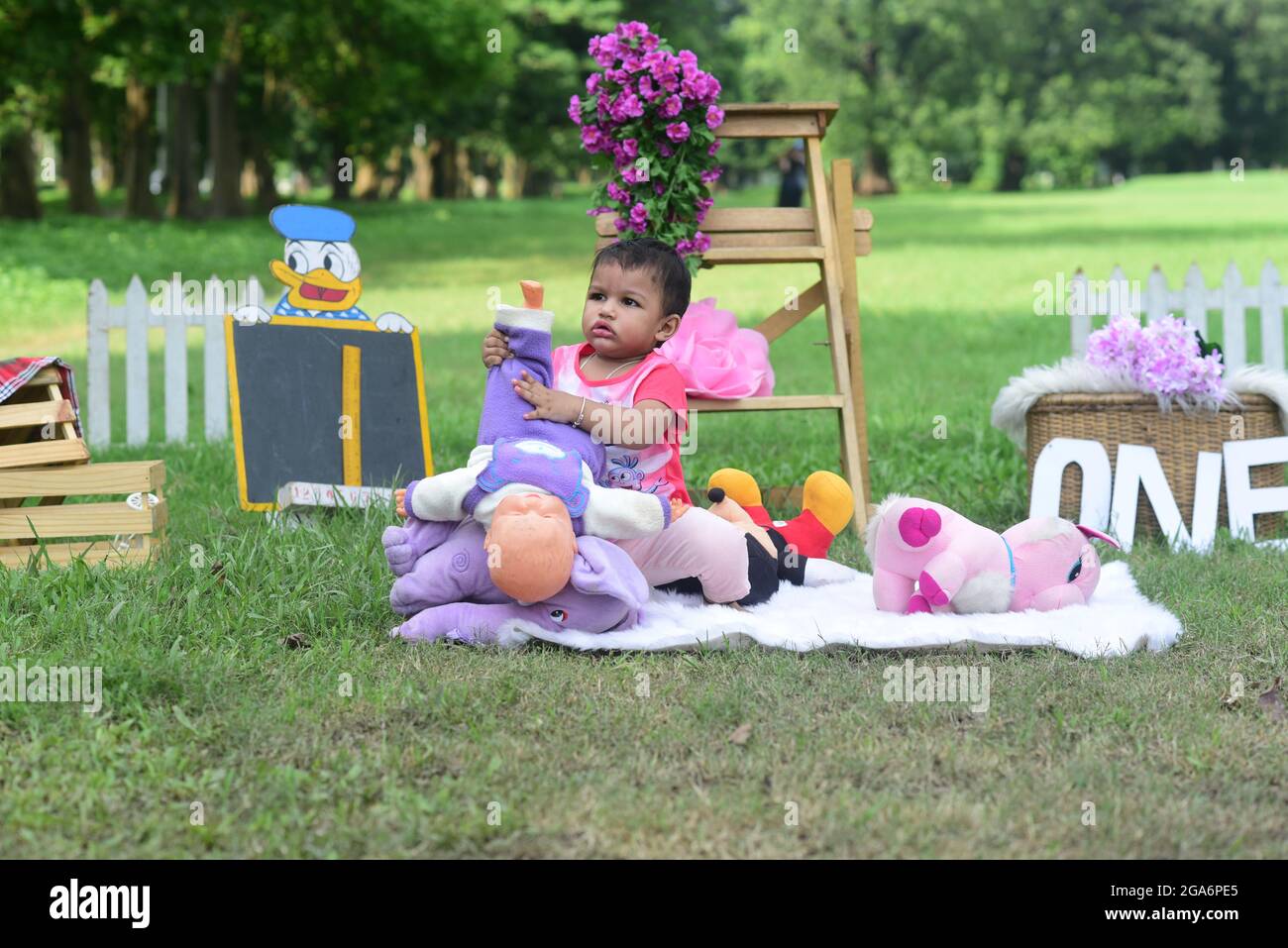 KOLKATA, INDIA Jun 24, 2021 Little girl playing with doll house in