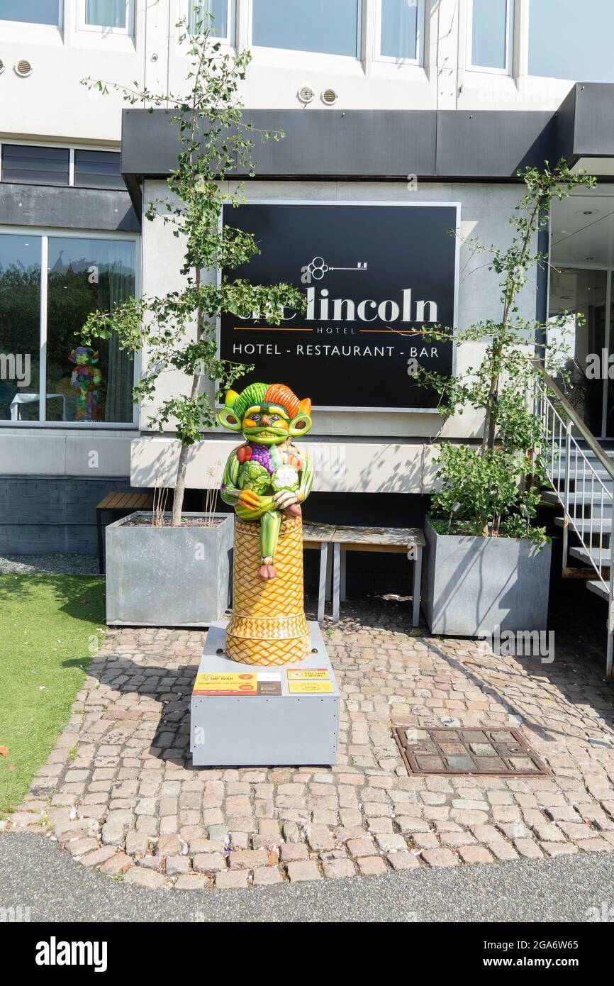 Lincoln imp statue Arcimpboldo the healthy imp outside of The Lincoln Hotel Eastgate, Lincoln city, lincolnshire 2021 Stock Photo