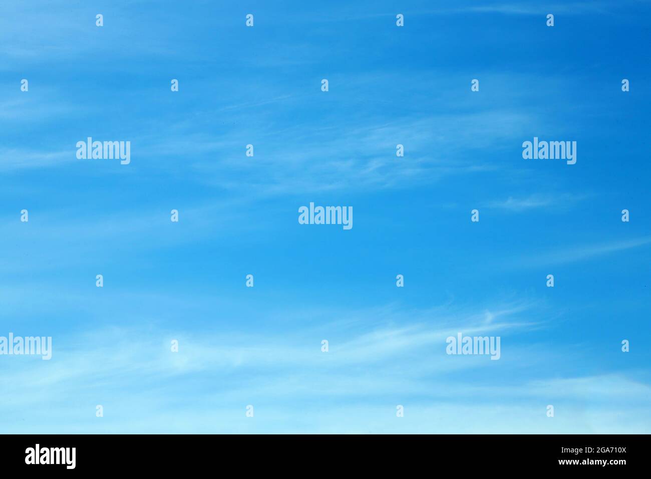 Blue sky background with clouds Stock Photo - Alamy