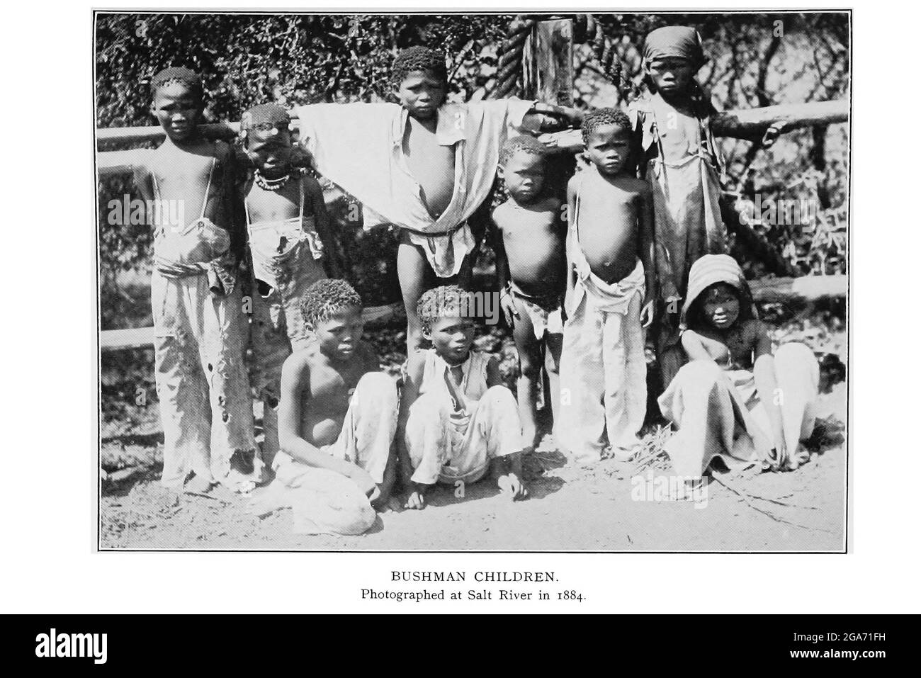 Bushman Children Photographed in Salt River in 1884 From the book '  Specimens of Bushman folklore ' by Bleek, W. H. I. (Wilhelm Heinrich Immanuel), Lloyd, Lucy Catherine, Theal, George McCall, 1837-1919 Published in London by  G. Allen & Company, ltd. in 1911. The San peoples (also Saan), or Bushmen, are members of various Khoe, Tuu, or Kxʼa-speaking indigenous hunter-gatherer groups that are the first nations of Southern Africa, and whose territories span Botswana, Namibia, Angola, Zambia, Zimbabwe, Lesotho and South Africa. Stock Photo