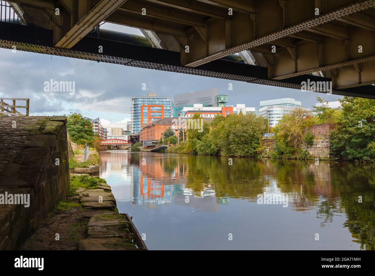 View from the Salford side over the River Irwell to Spinningfields and the Manchester Marriott Victoria & Albert Hotel Manchester, north-west England Stock Photo