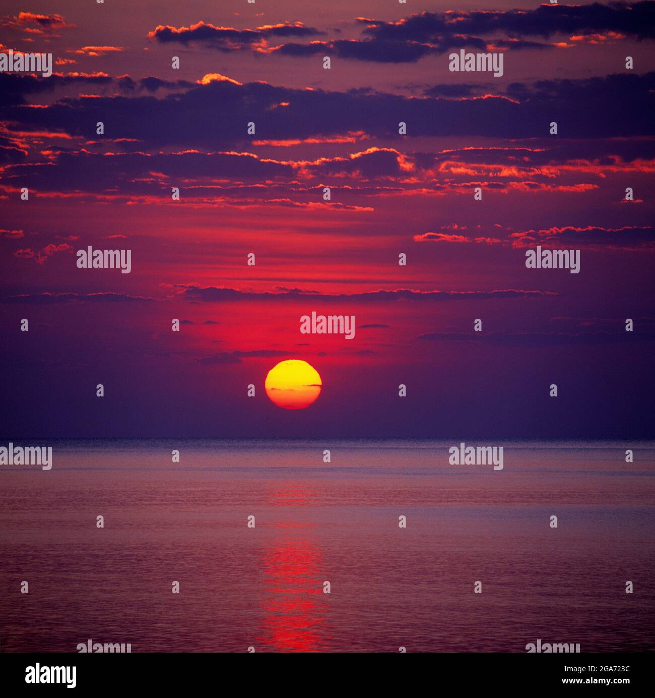 Australia. Queensland. Sun rising over the Pacific Ocean. Stock Photo