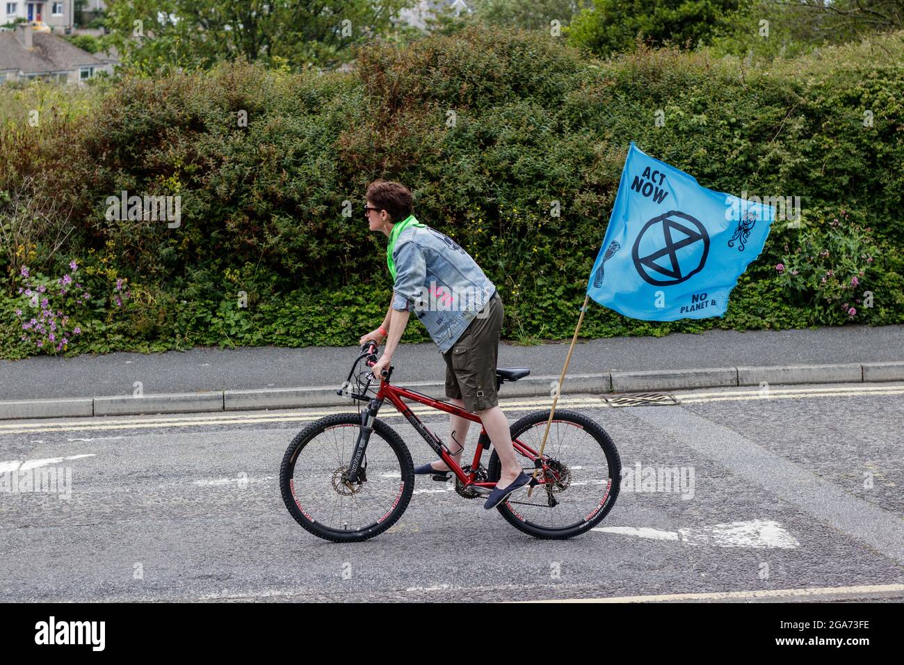 Extinction Rebellion, Animal Rebellion and other groups took to the streets of St Ives to demand action from the governments attending the G7. Stock Photo