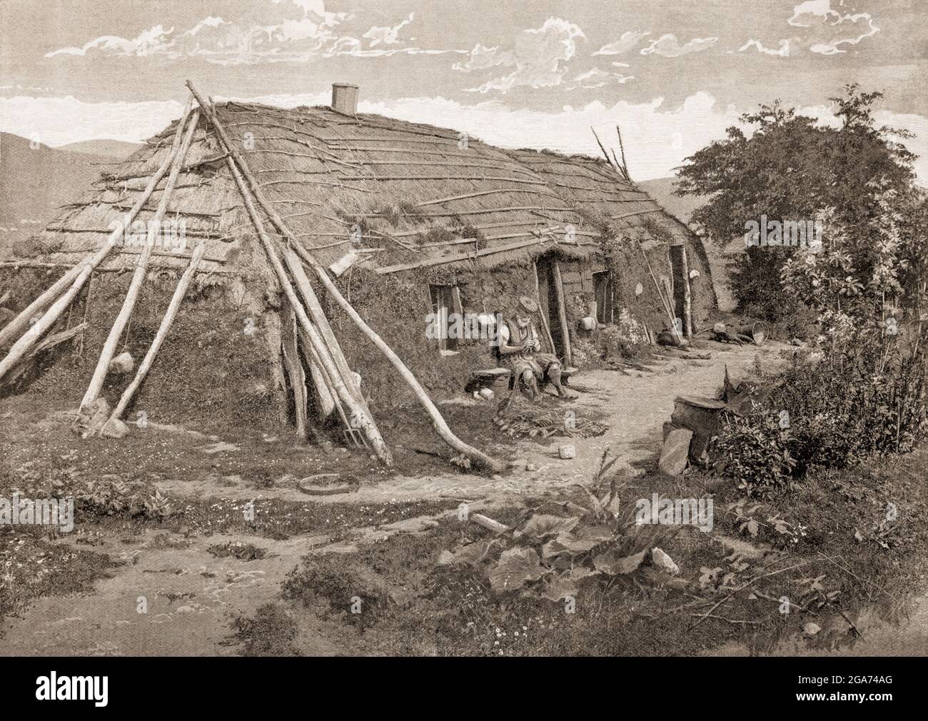 A late 19th century view of a crofter's cottage near Lochaber in the Scottish Highlands. Crofting is a form of land tenure and small-scale food production particular to Scotland. During the 19th century individual crofts were established on the better land, and a large area of poorer-quality hill ground was shared by all the crofters of the township for grazing their livestock. The Crofters' Holdings (Scotland) Act 1886 provided for security of tenure, and encouraged tenants to improve the land under their control, ensuring control could be transferred within families to future generations. Stock Photo