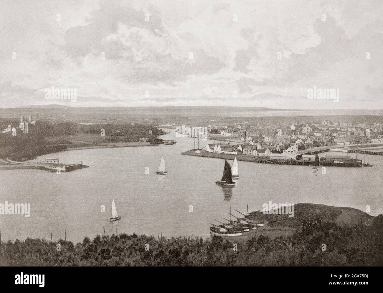 A late 19th century view of the harbour in Stornoway, the main town of the Western Isles and the capital of Lewis and Harris in the Outer Hebrides, Scotland. The sheltered harbour is the reason for the towns existence and was named by the visiting Vikings 'Steering Bay' which, when phonetically translated, became the name Stornoway. Stornoway is the main port on the Island, due to its sheltered location with the ferry to Ullapool a regular visitor. Stock Photo
