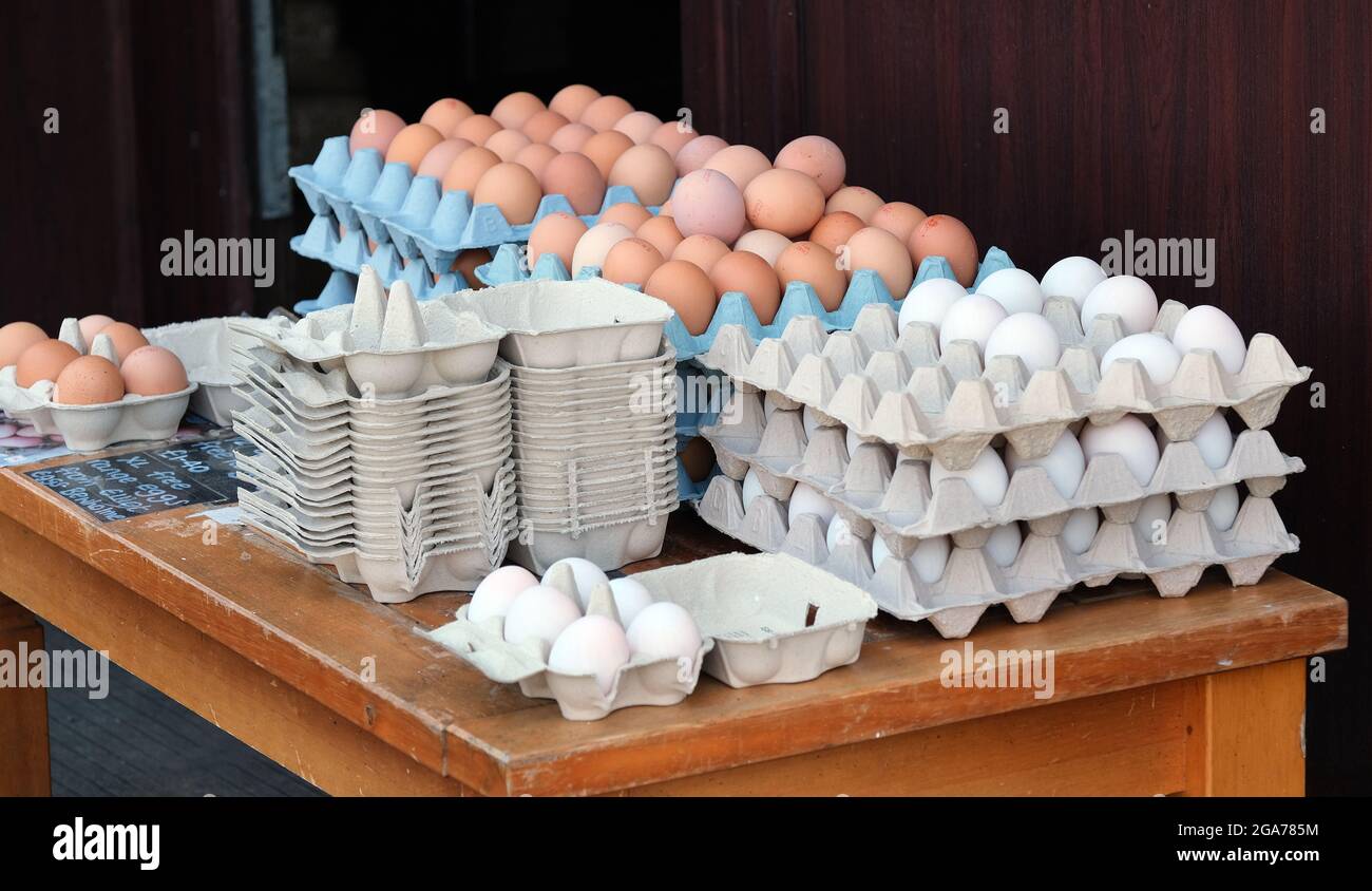 Eggs for sale outside small local rural shop Stock Photo Alamy