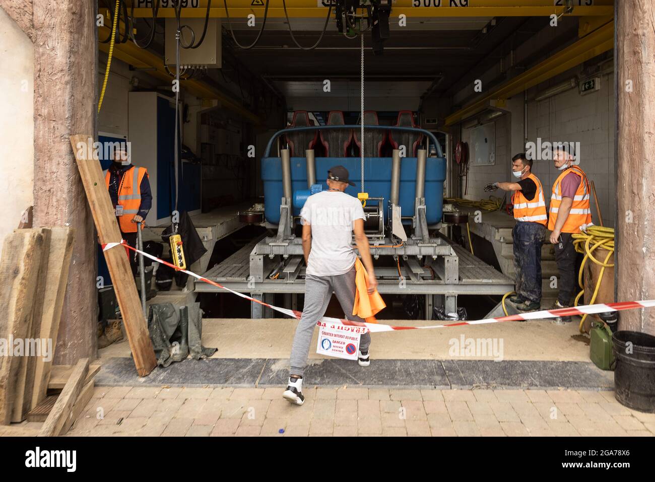 Illustration picture shows workers inspecting technical installations at the Walibi amusement park in Wavre, on Thursday 29 July 2021. The park announ Stock Photo
