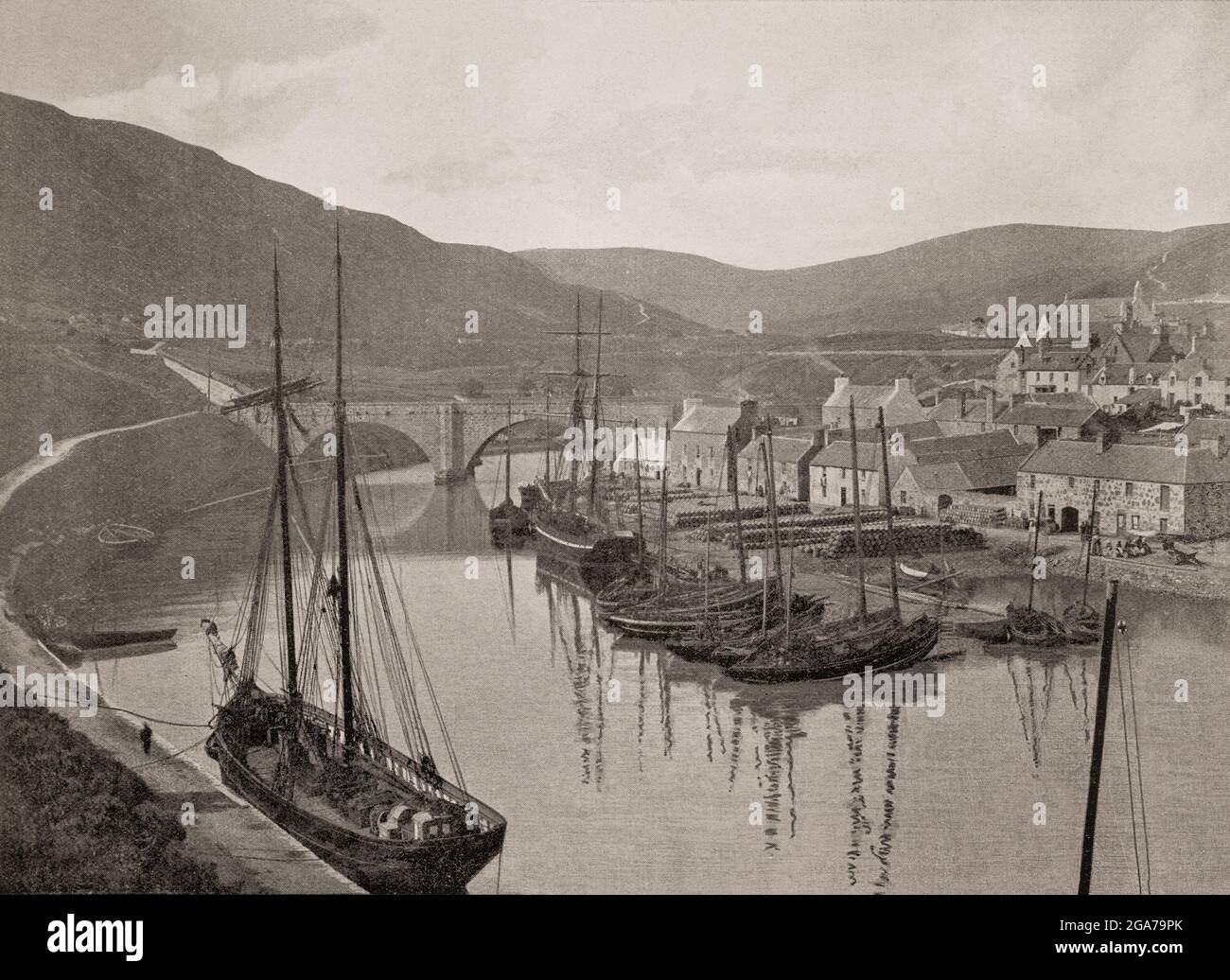 A late 19th century view of Helmsdale, a village on the banks of the River Helmsdale on the east coast of Sutherland, in the Highland council area of Scotland. The modern village was planned in 1814 to resettle communities that had been removed from the surrounding straths as part of the Highland Clearances. In 1869, two tributaries of the river were the scene of a gold rush when Robert Nelson Gilchrist, a native of Kildonan, who had spent 17 years in the goldfields of Australia was given permission by the Duke of Sutherland to pan the gravels of the Helmsdale River and burns and tributaries. Stock Photo