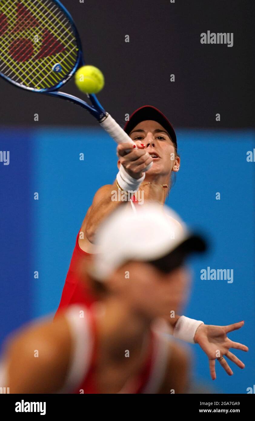 Tokyo, Japan. 29th July, 2021. Belinda Bencic (up) of Switzerland competes during the tennis women's doubles semifinal between Laura Pigossi/Luisa Stefani of Brazil and Belinda Bencic/Viktorija Golubic of Switzerland at the Tokyo 2020 Olympic Games in Tokyo, Japan, July 29, 2021. Credit: Li Yibo/Xinhua/Alamy Live News Stock Photo