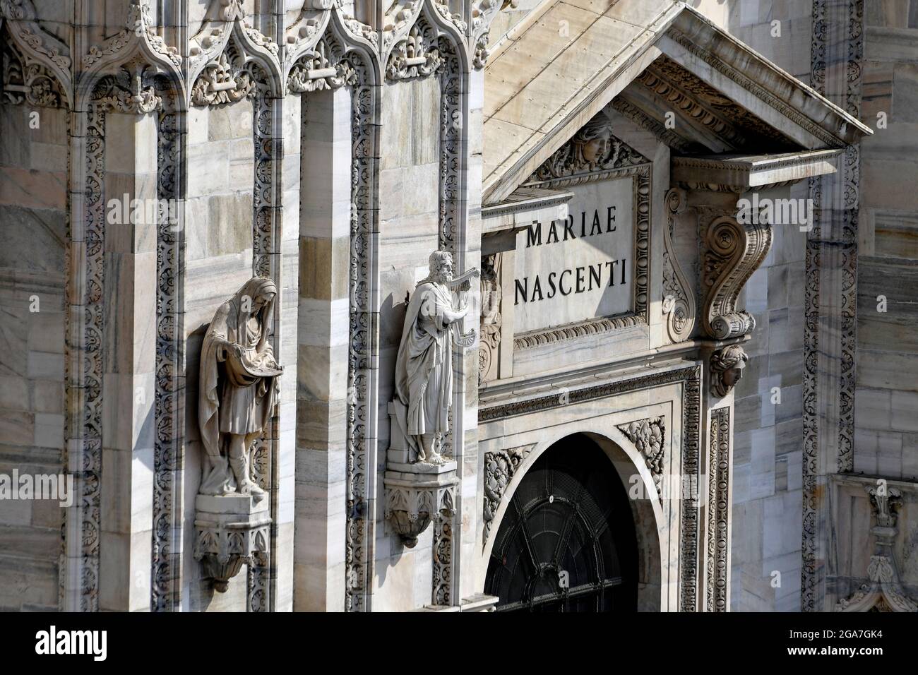 External ornamental detail of the Duomo gothic cathedral, in Milan. Stock Photo