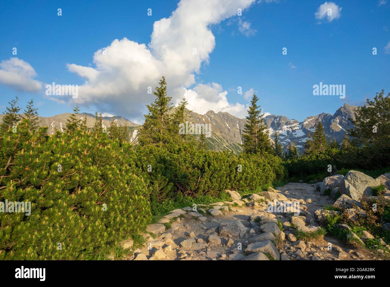 Clouds over the peaks of the Tatra Mountains Stock Photo - Alamy