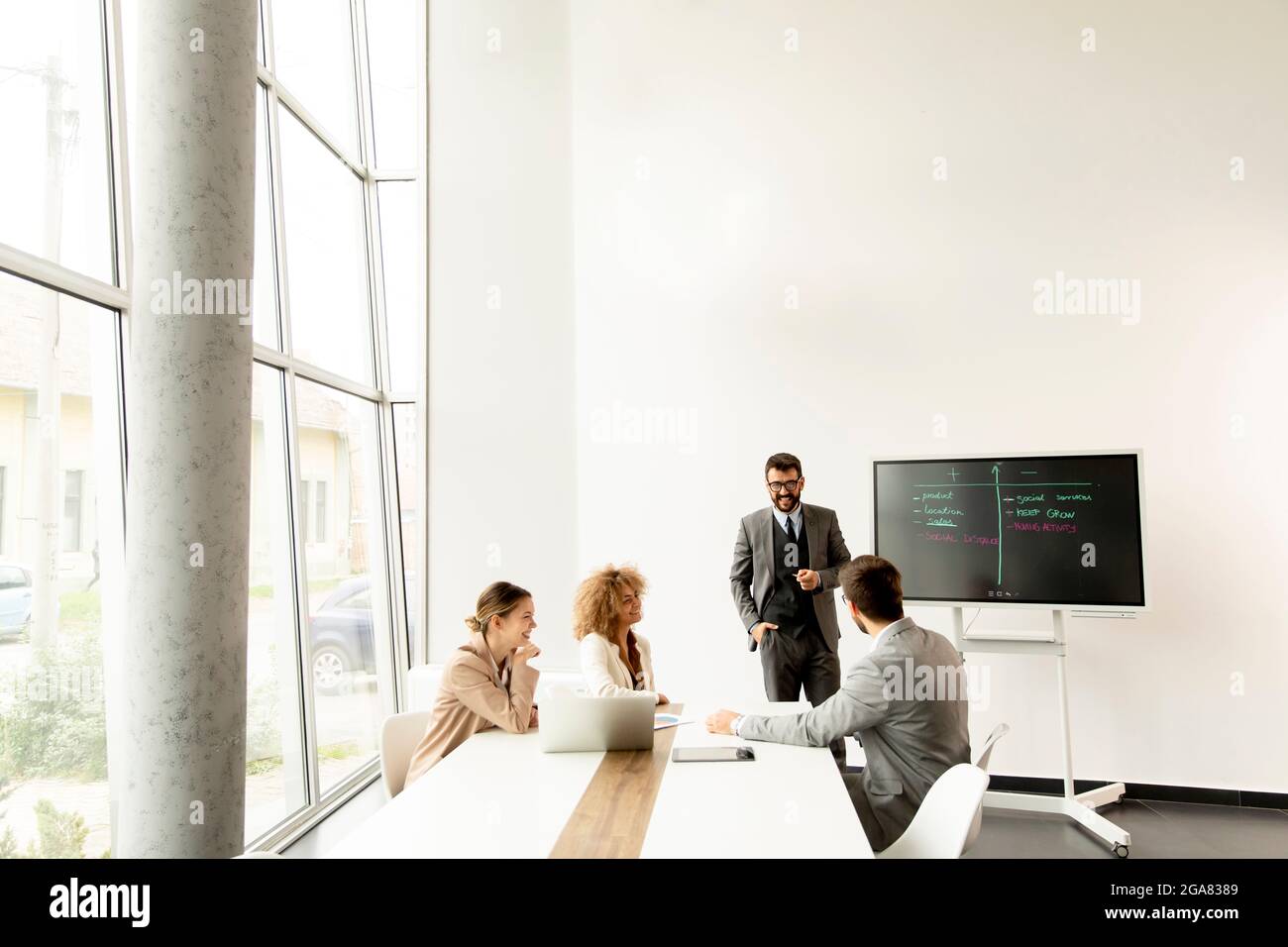Group of multiethnic young business people working together in the office Stock Photo