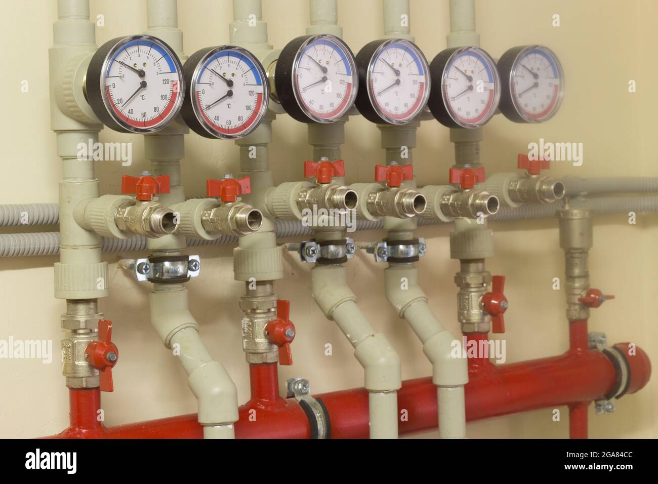 Fixed color coded compressed air line with pressure regulator, scale and  flexibly hose reel, wall mounted, Melbourne 2015 Stock Photo - Alamy