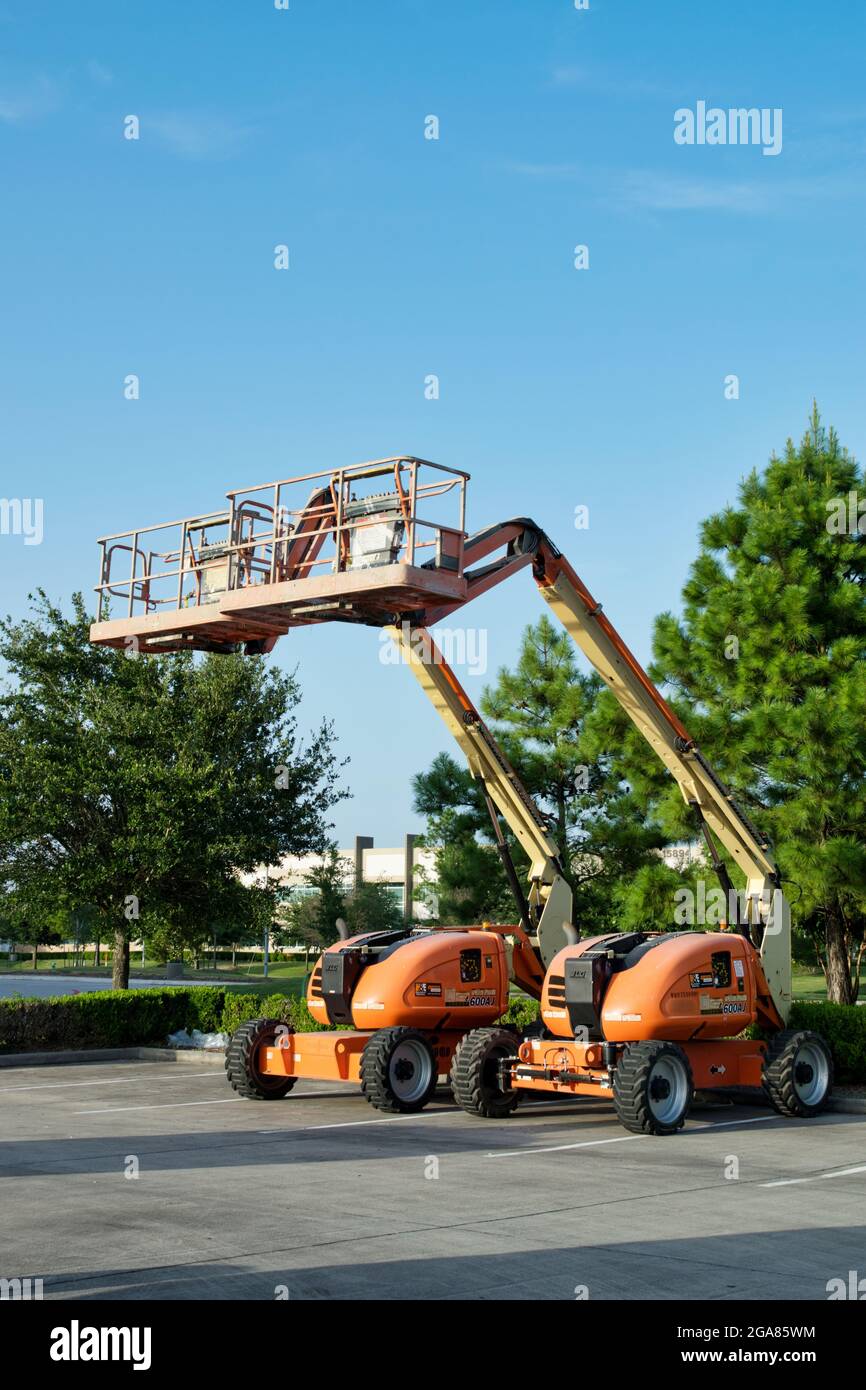 Houston, Texas USA 07-25-2021: Two industrial hydraulic 600 AJ skyjacks  parked together in a parking lot with boom lifts raised in Houston, TX  Stock Photo - Alamy