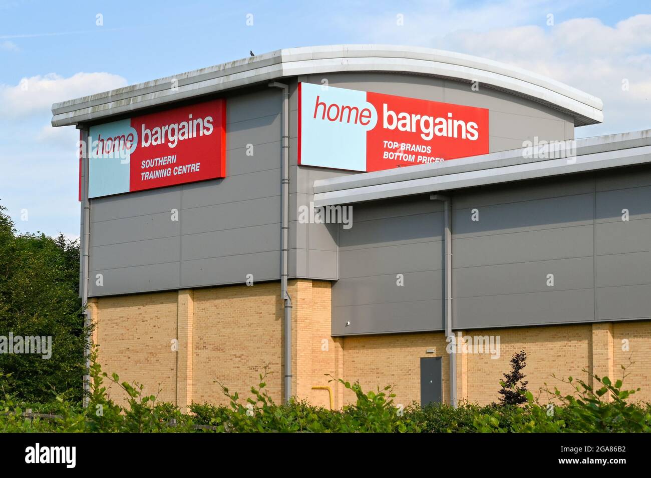 Andover, England - June 2021: Sign on the outside of the Southern Training and Distribution Centre of the Home bargains chain of discount stores Stock Photo