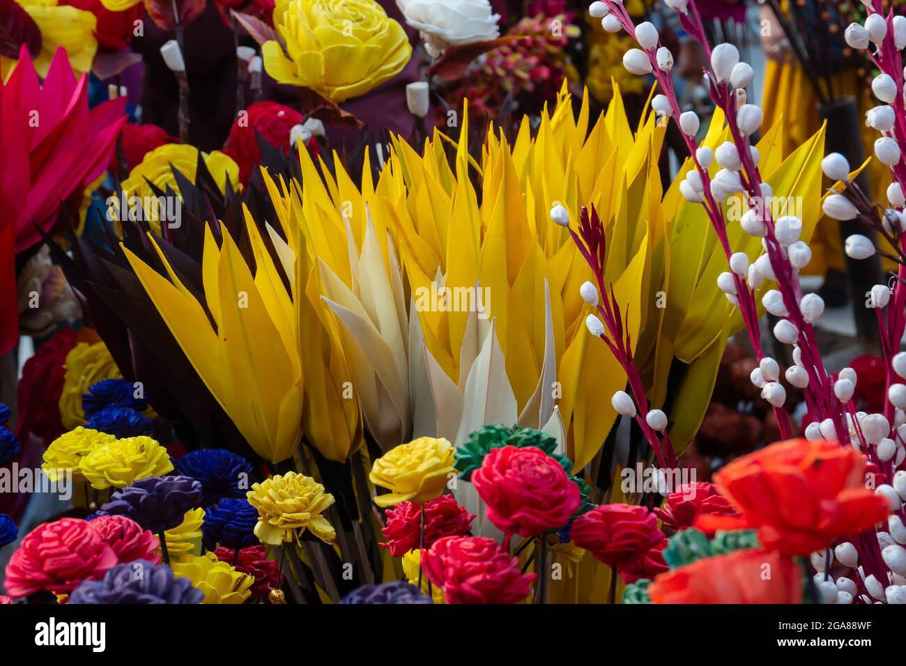 Colorful artificial flowers made out of colored sola, spongewood