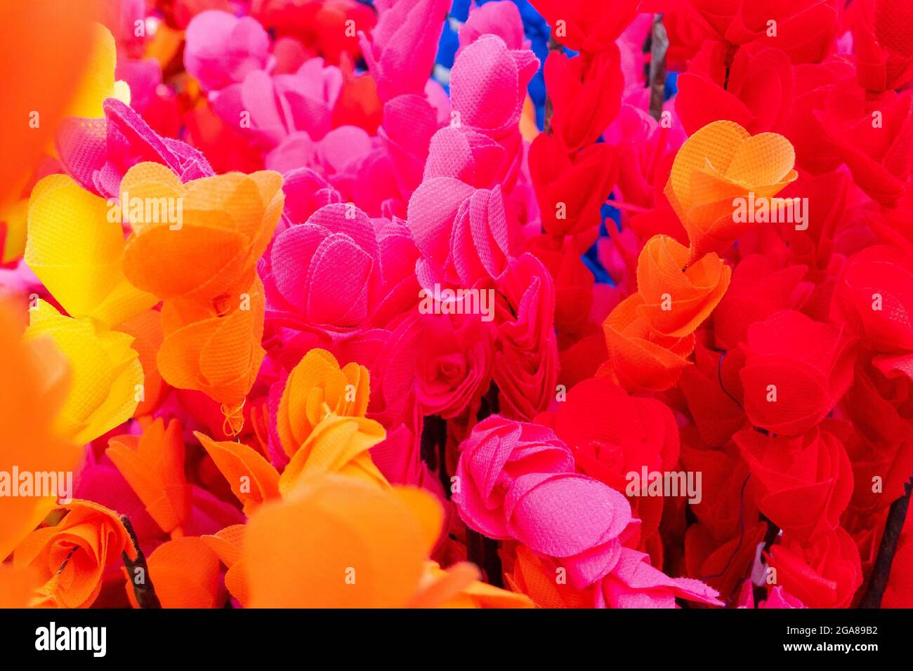 Colorful artificial flowers made out of colored sola, spongewood