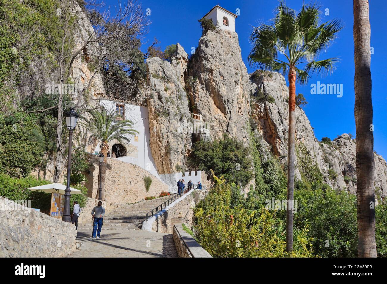 Guadalest village is in the Alicante province in the region of Valencia and Murcia, Spain. This is the walkway up to the entrance in the mountain Stock Photo