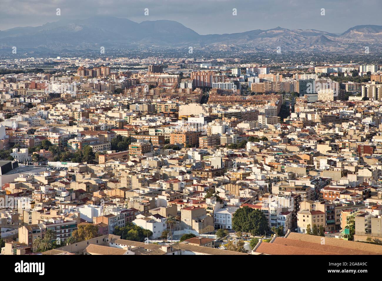 An aerial view westwards of Alicante city from the castle of Santa Barbara high up on a promontory, Alicante, Spain Stock Photo
