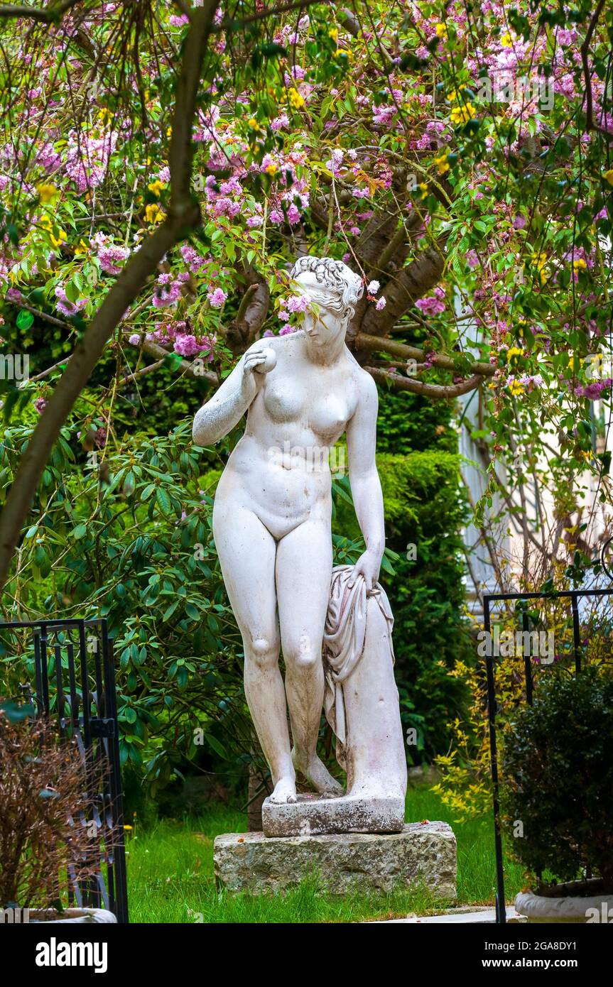 nude female statue in garden,Giverny; Normandy; France; Eure; Europe; springtime Stock Photo