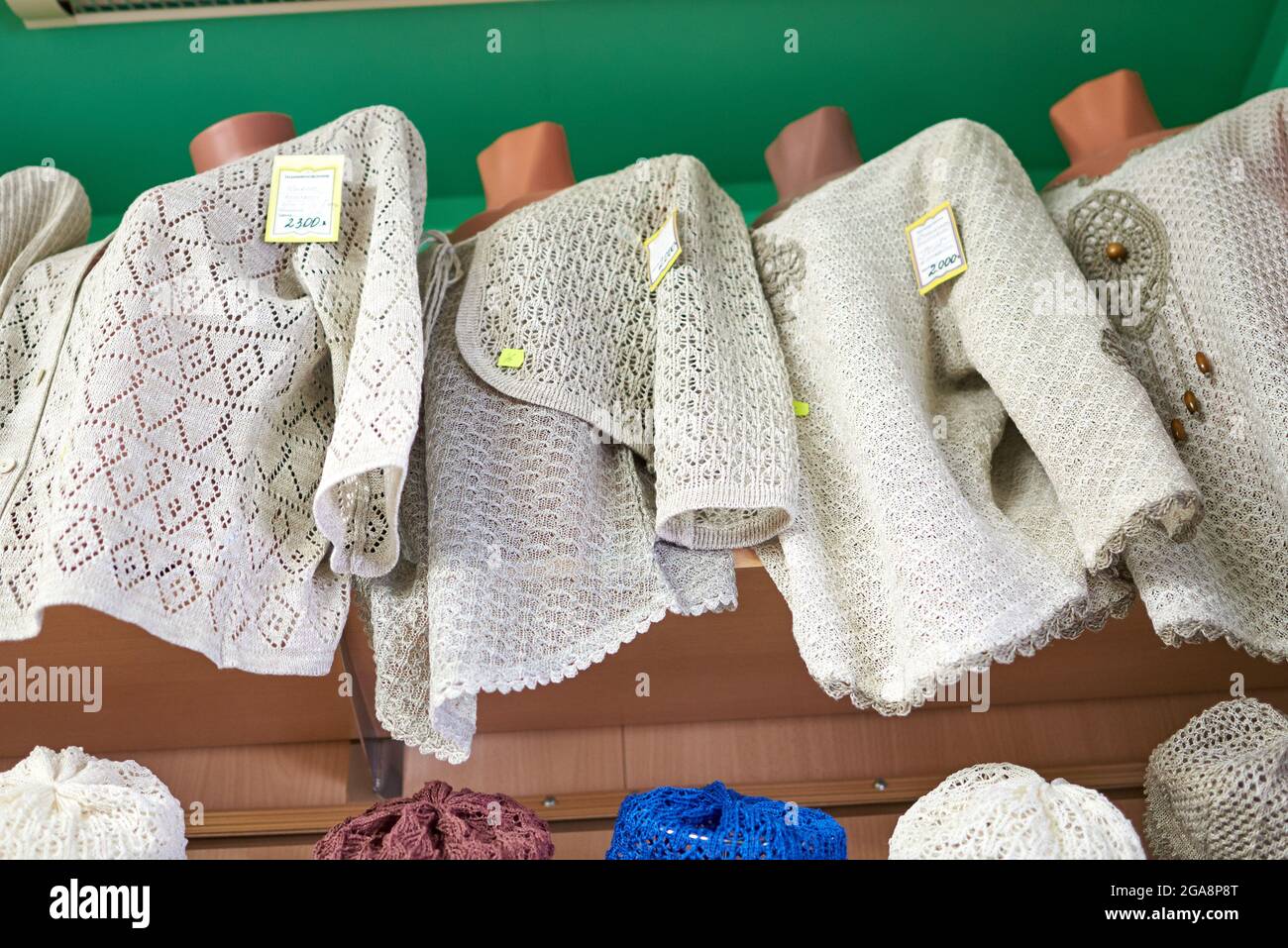 Knitted openwork bolero blouses made of cotton or linen Stock Photo