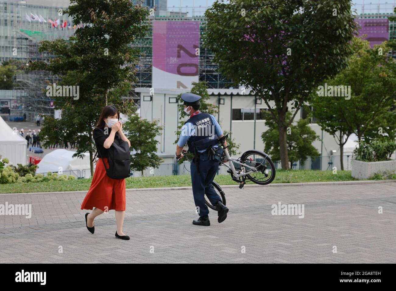 A police officer seen at the Aomi Urban Sports Park construction site