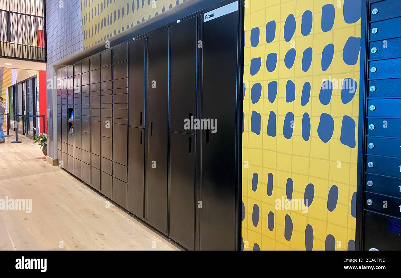 Orlando, FL USA - August 5, 2020:  An Amazon hub locker in an apartment complex where packages are delivered safely to residents. Stock Photo