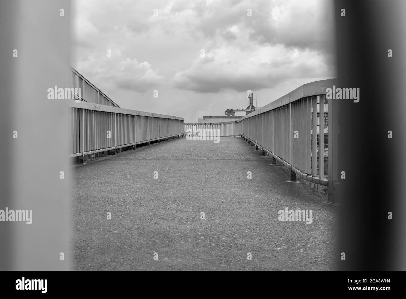 German pedestrian bridge in black and white Stock Photo