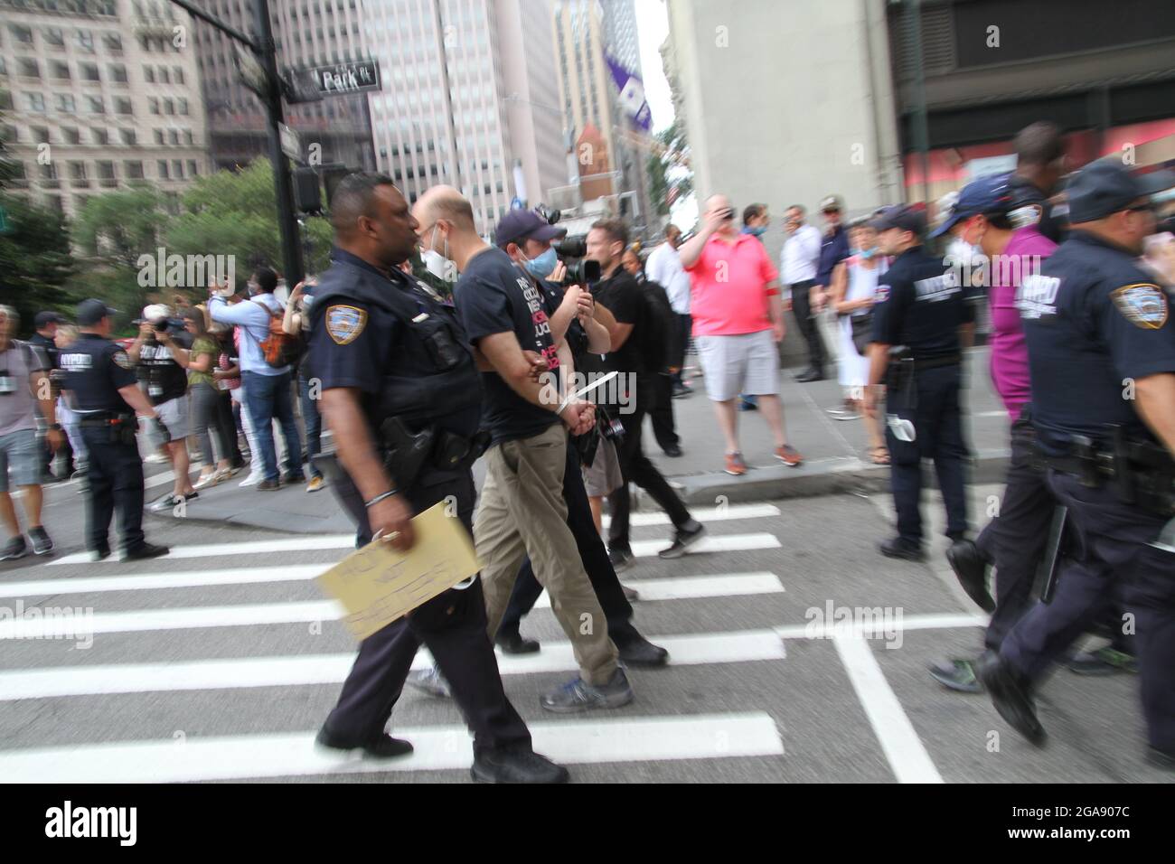July 29, 2021, New York, New York, USA: New York,   Housing Works inc. Advocacy group holds a rally and civil disobedience by laying down and blocking Broadway in front of City Hall. New York City Police Department officers arrested 9 people. (Credit Image: © Bruce Cotler/ZUMA Press Wire) Stock Photo