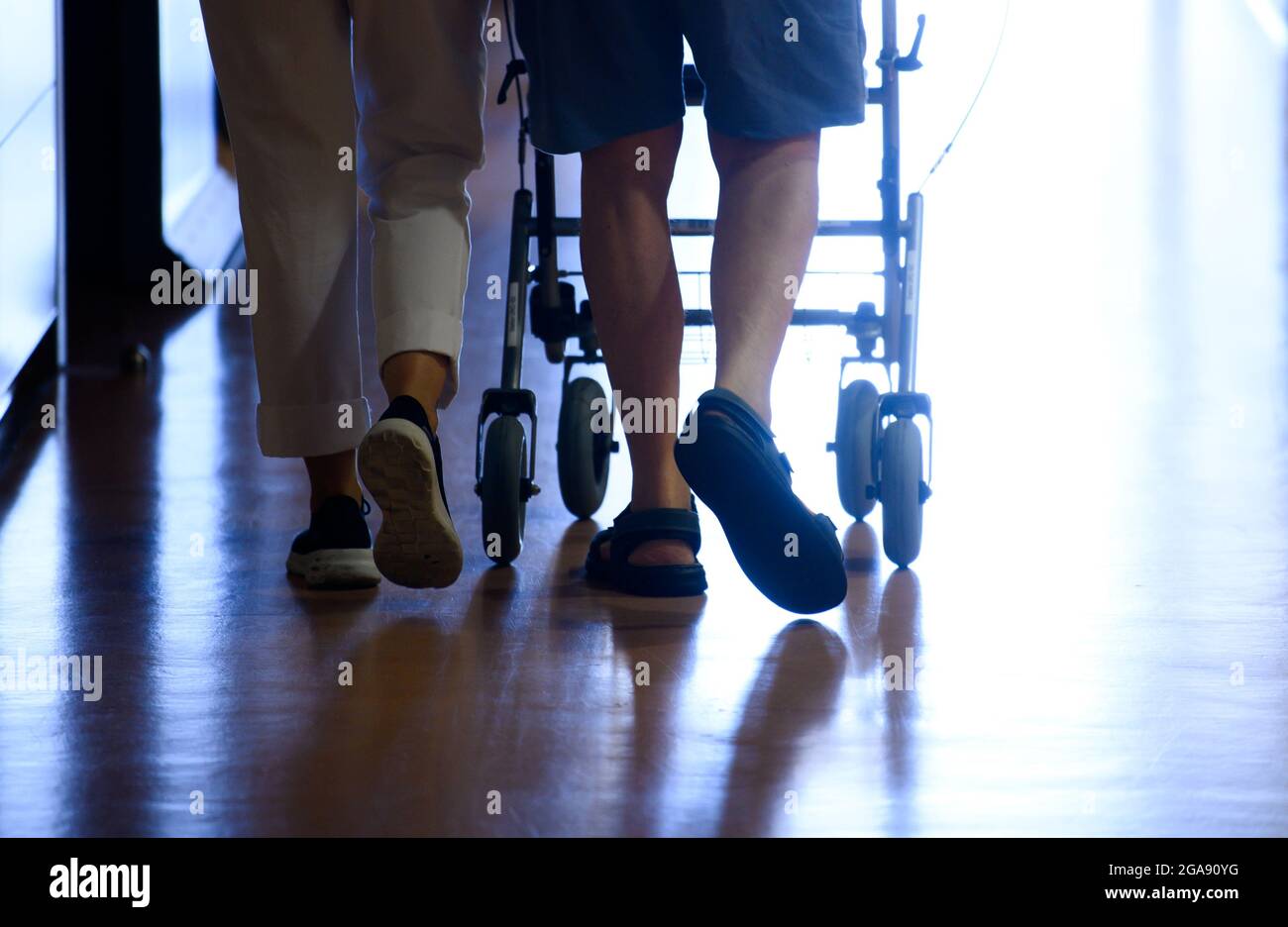 Dresden, Germany. 28th July, 2021. A nurse walks down the hospital