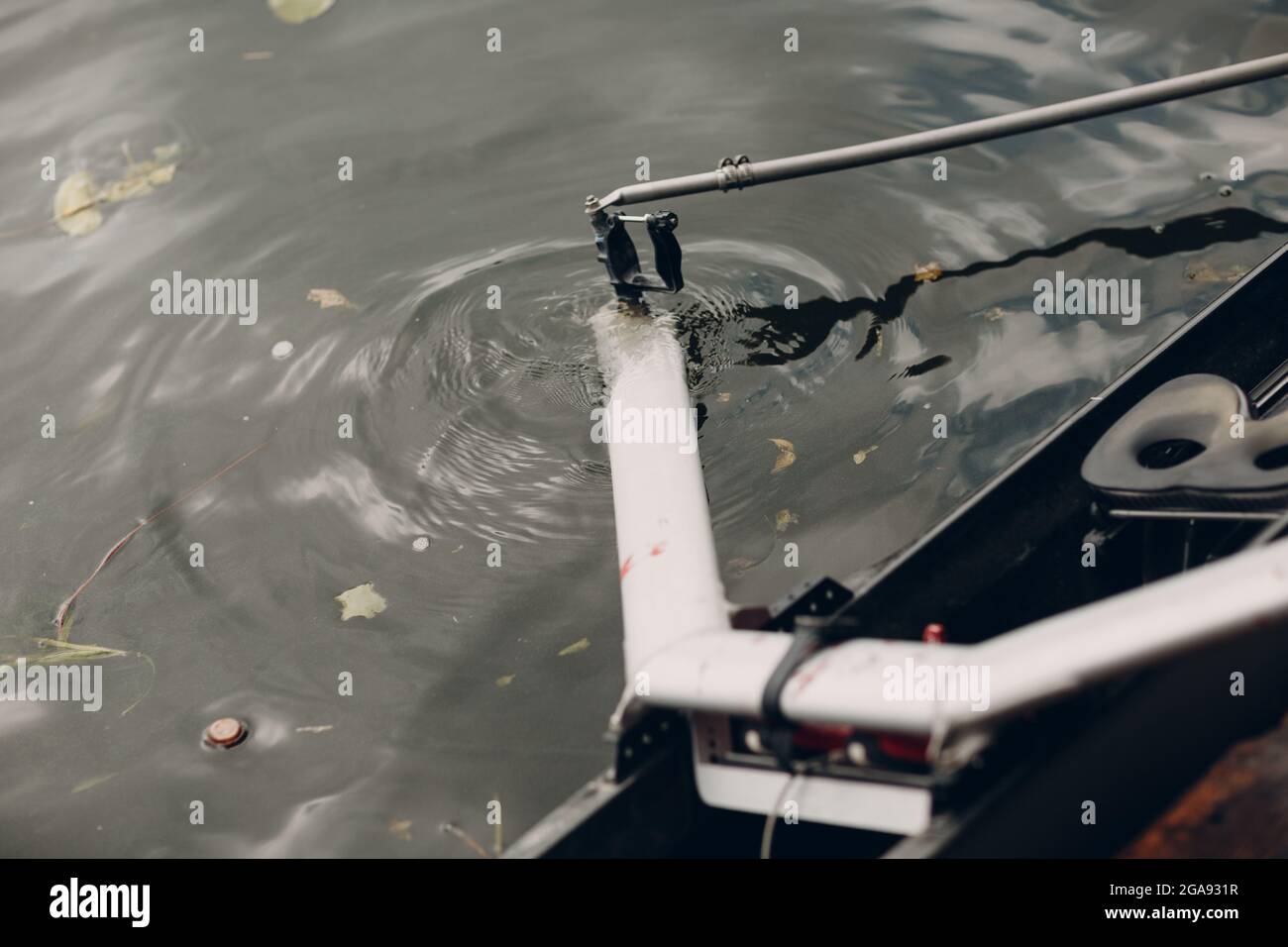 Paddle rowlock of rowing boat at water surface Stock Photo - Alamy